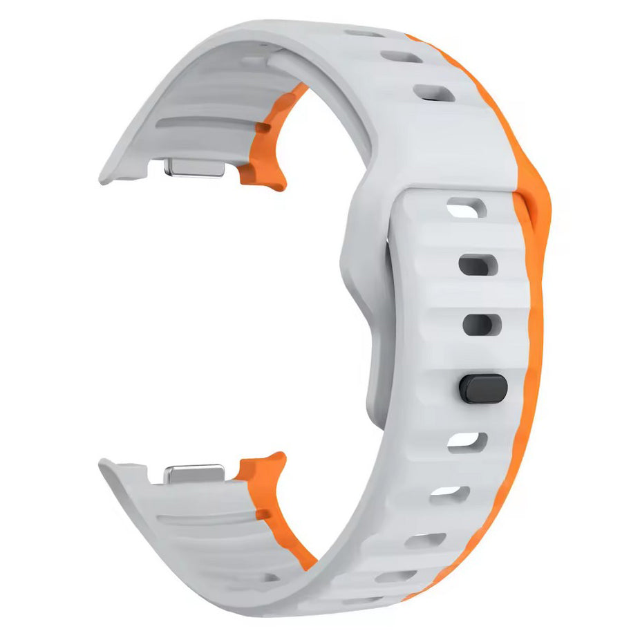 Samsung Galaxy Watch 9 44mm textured silicone band in grey orange