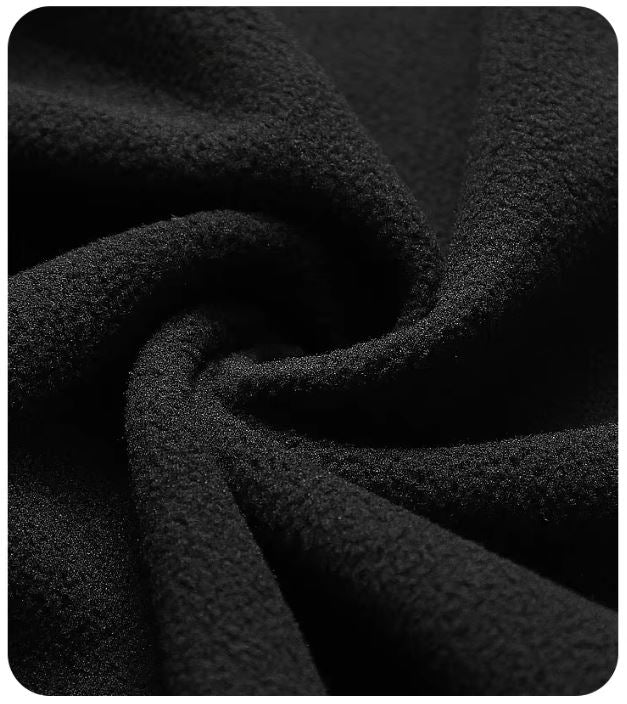 Close-up of black textured fabric in running gloves